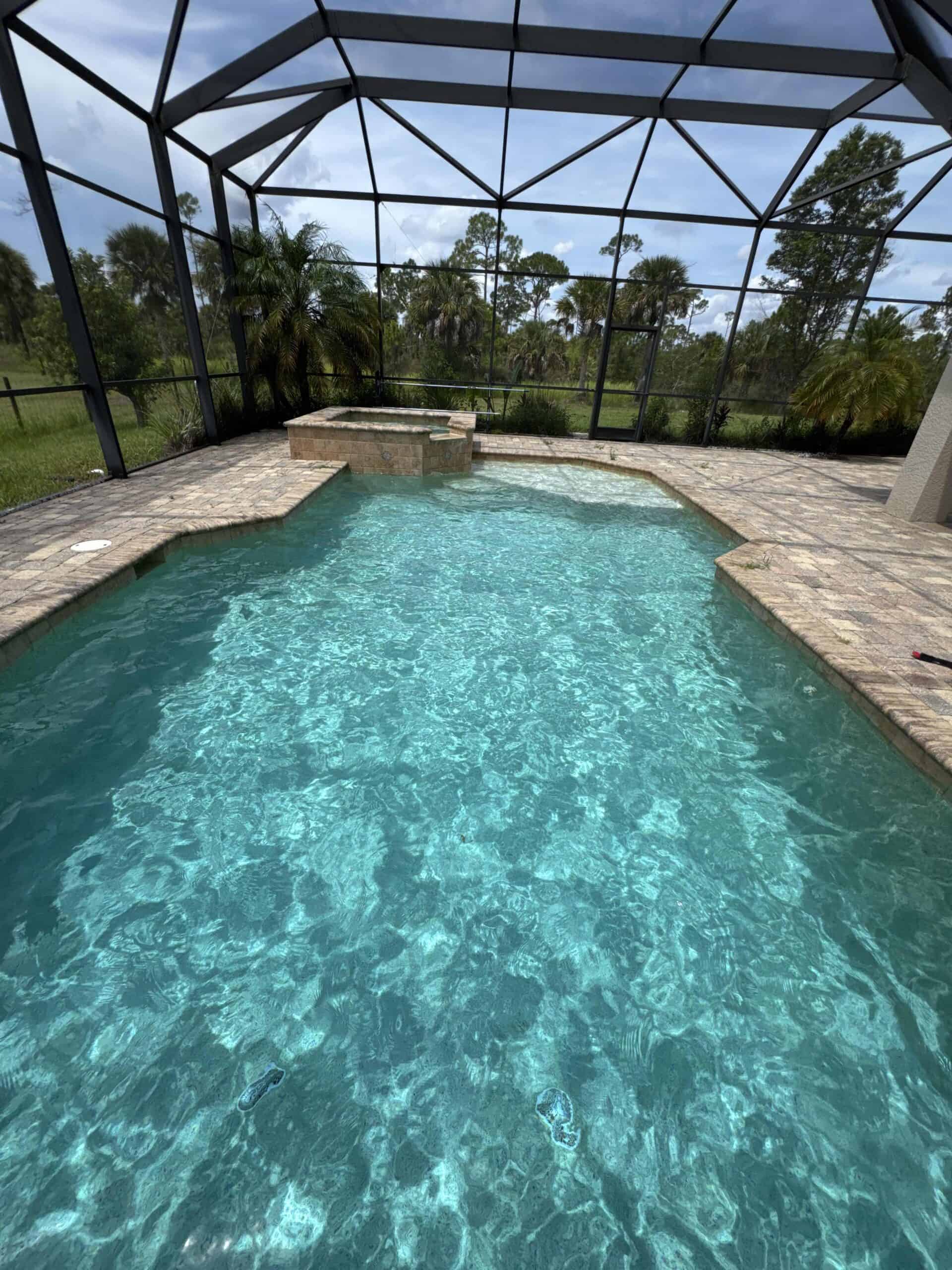 Crystal clear residential swimming pool after professional service