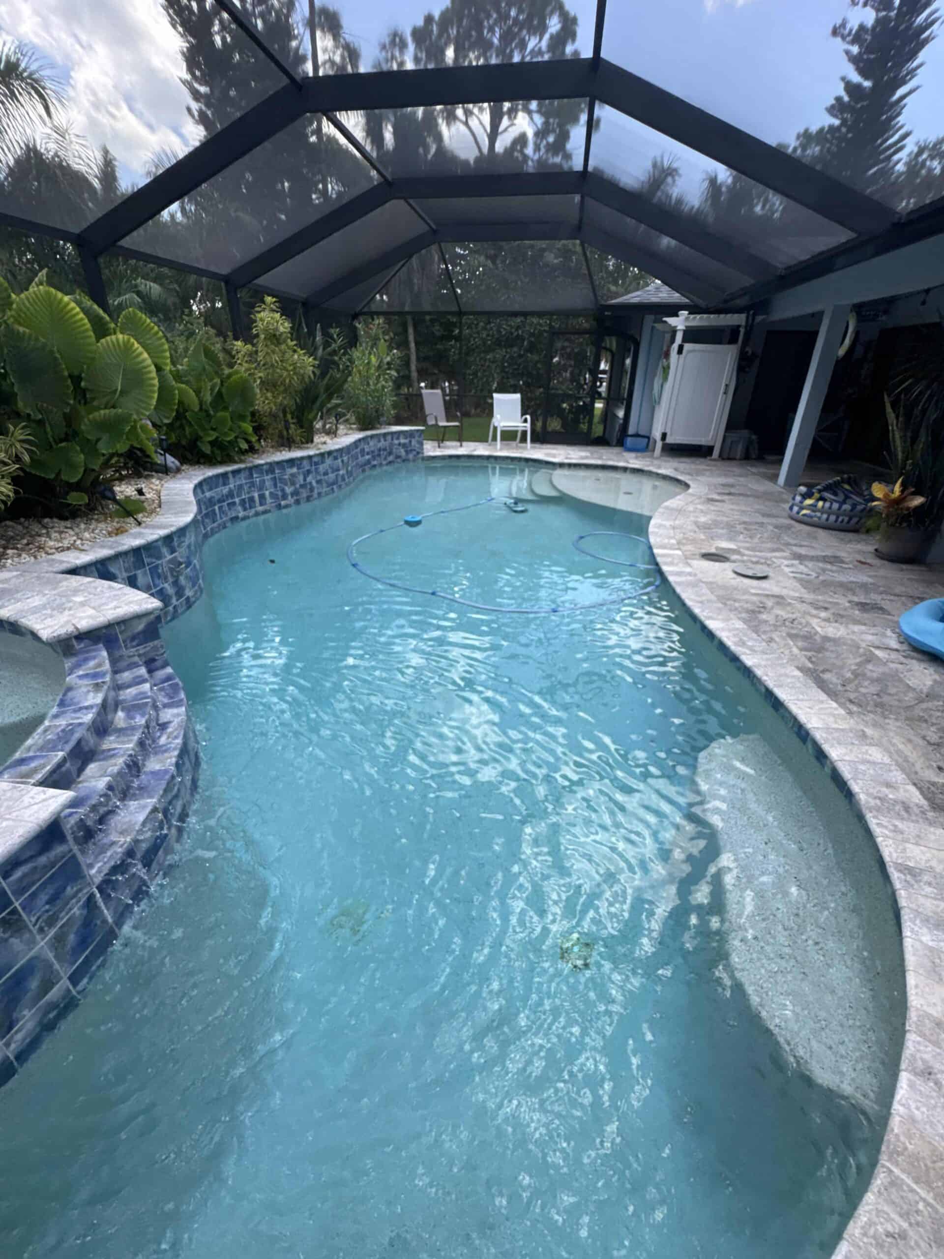 Residential swimming pool with clear water after routine professional care