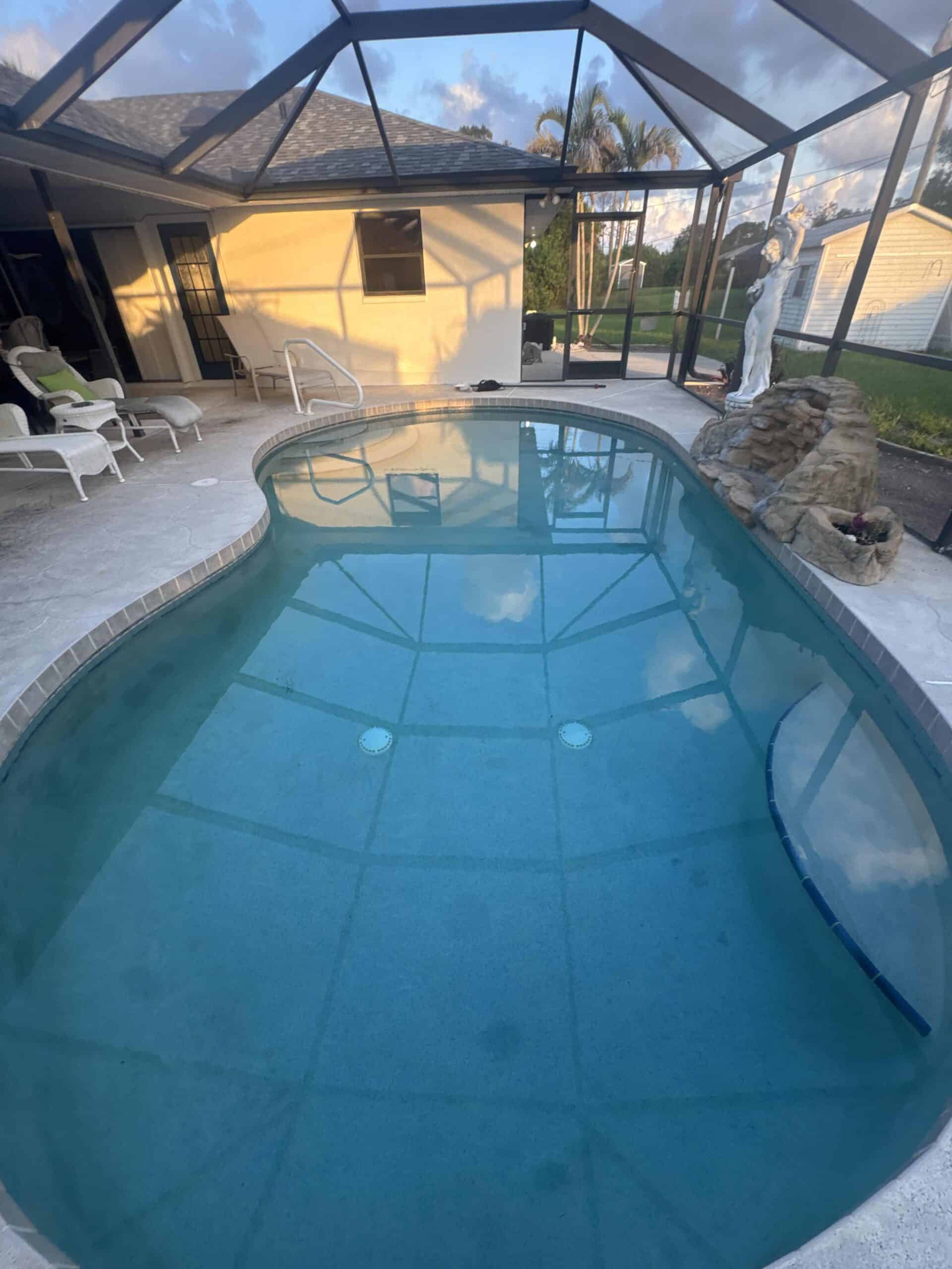 Beautiful illuminated residential swimming pool with clean water
